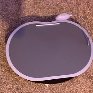 A lap desk with light